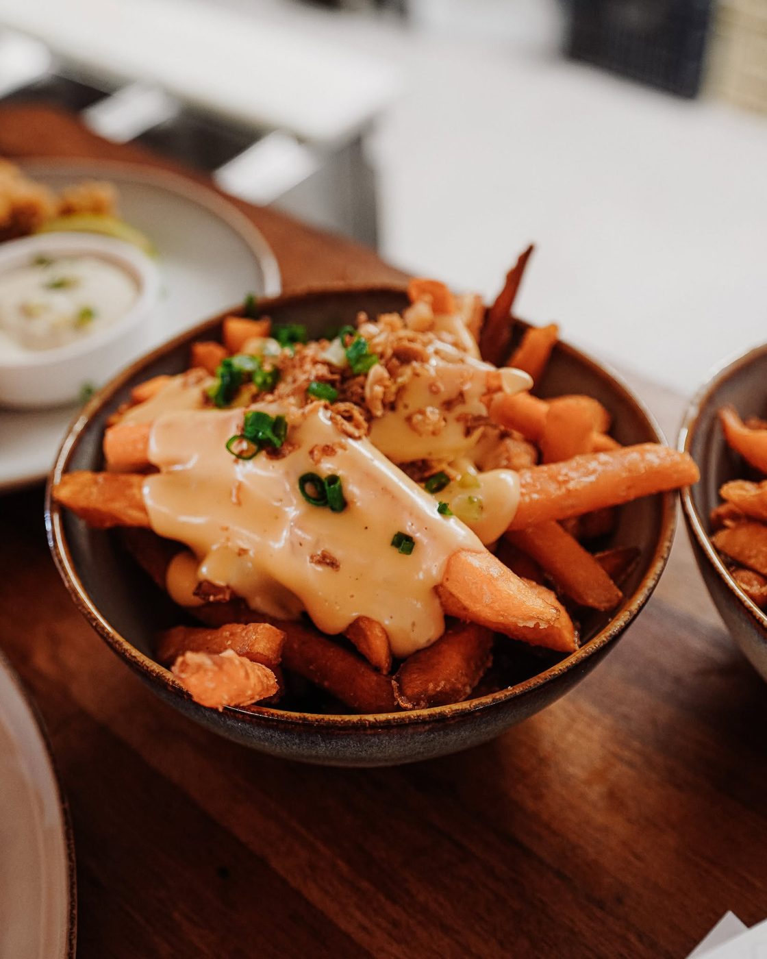 Frites de patate douce sauce cheddar, tapas du Manaïa